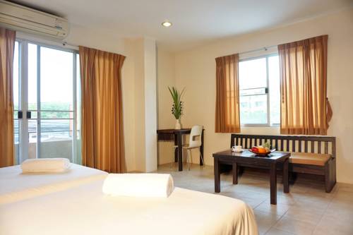 Imagen de la habitación del Hotel Chaofa West Suites. Foto 14