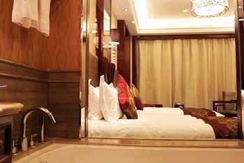 Imagen de la habitación del Hotel Chaohu Yuanzhou Haoting. Foto 6