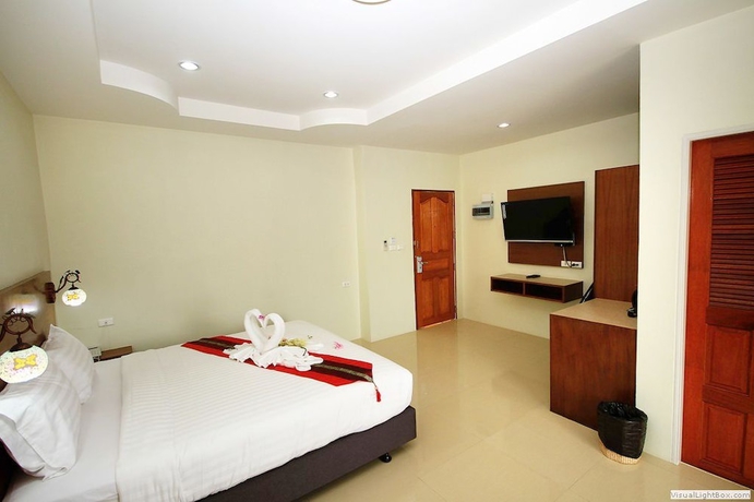 Imagen de la habitación del Hotel Chaophaya Thara Riverside. Foto 3