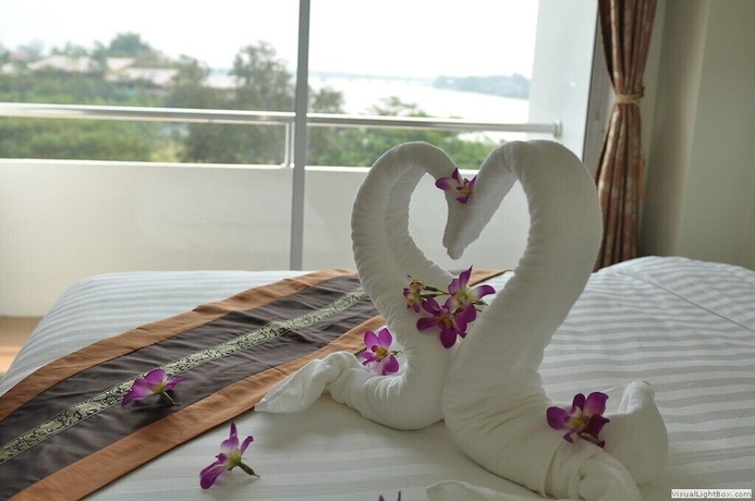 Imagen de la habitación del Hotel Chaophaya Thara Riverside. Foto 5