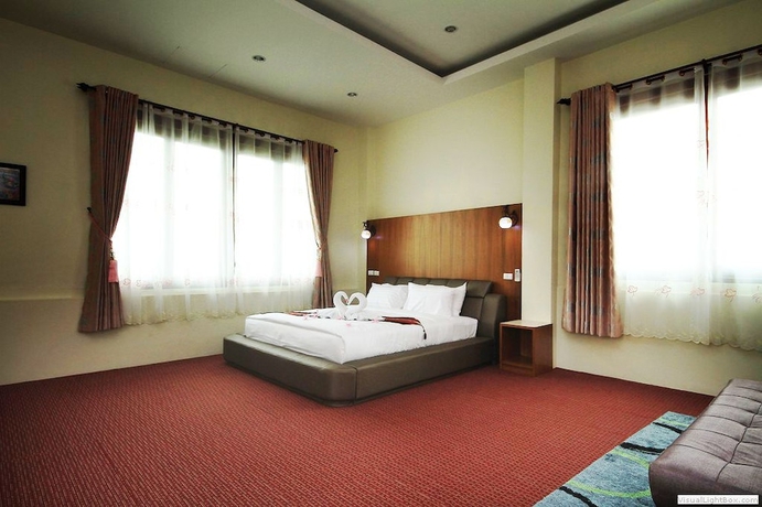 Imagen de la habitación del Hotel Chaophaya Thara Riverside. Foto 6