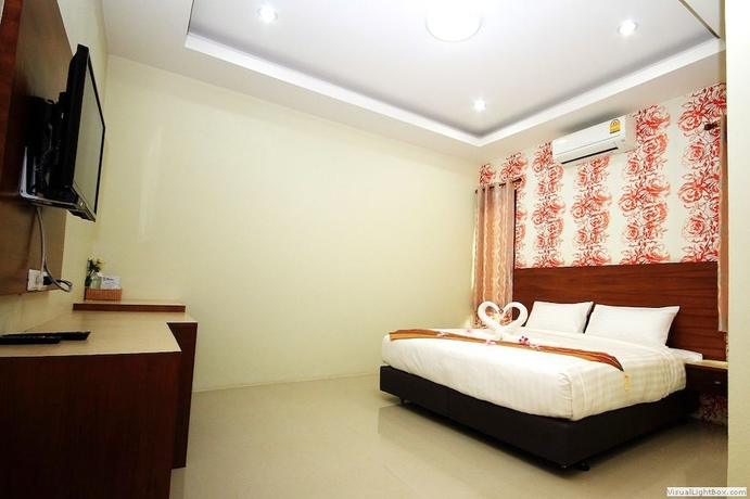 Imagen de la habitación del Hotel Chaophaya Thara Riverside. Foto 8
