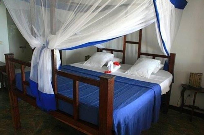 Imagen de la habitación del Hotel Chapwani Island. Foto 11