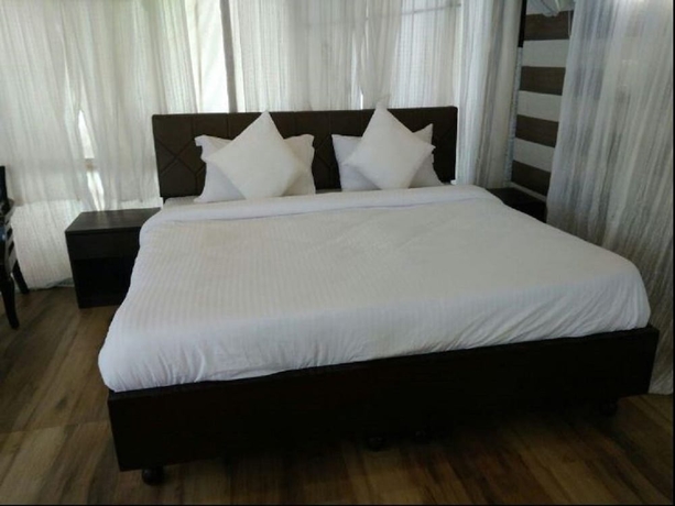 Imagen de la habitación del Hotel Charekh Food and Forest Resort. Foto 8