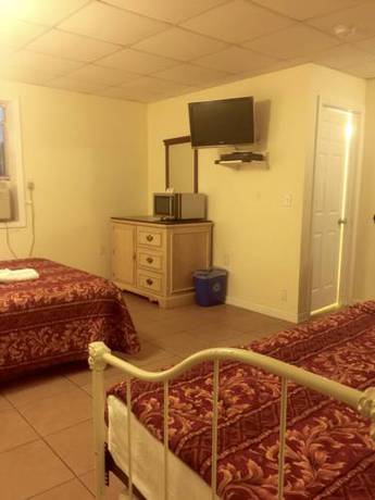 Imagen de la habitación del Hotel Charlee Villas By The Beach. Foto 6