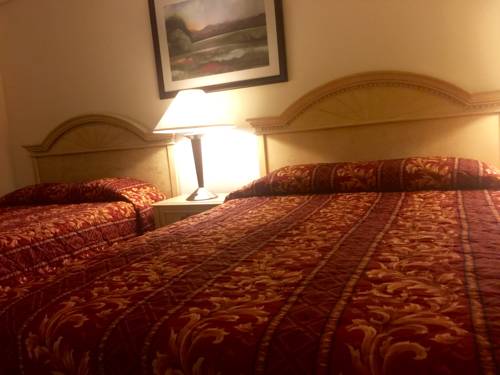 Imagen de la habitación del Hotel Charlee Villas By The Beach. Foto 12