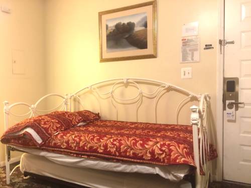 Imagen de la habitación del Hotel Charlee Villas By The Beach. Foto 14