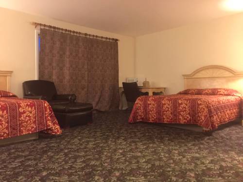 Imagen de la habitación del Hotel Charlee Villas By The Beach. Foto 15