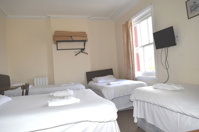 Imagen de la habitación del Hotel Charlies. Foto 5