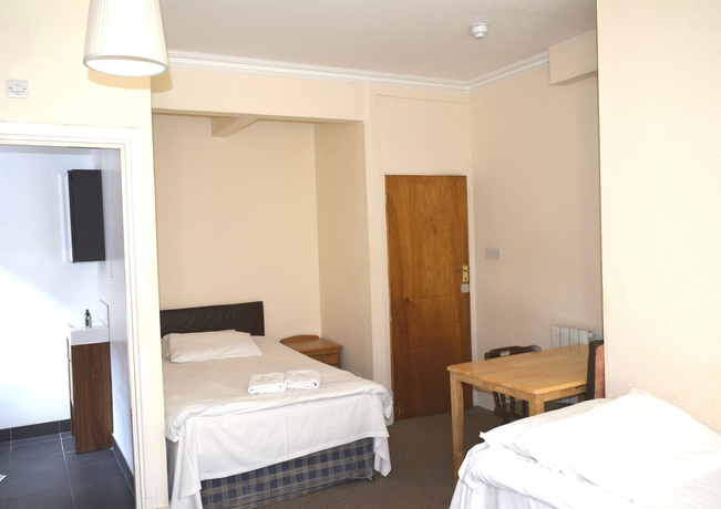 Imagen de la habitación del Hotel Charlies. Foto 6