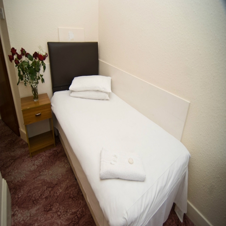 Imagen de la habitación del Hotel Charlies. Foto 8