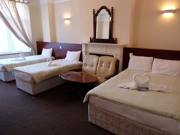 Imagen de la habitación del Hotel Charlotte Guest House. Foto 7