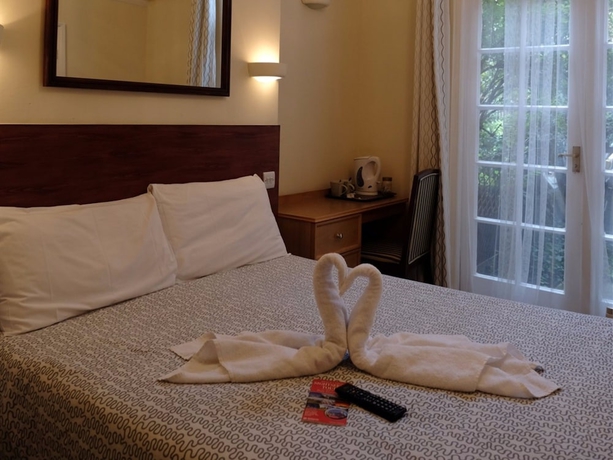 Imagen de la habitación del Hotel Charlotte Guest House. Foto 9