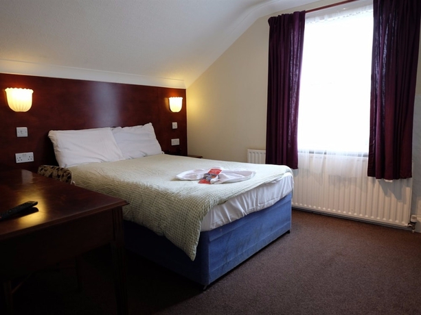 Imagen de la habitación del Hotel Charlotte Guest House. Foto 14