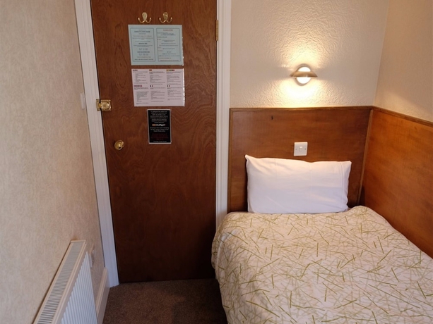 Imagen de la habitación del Hotel Charlotte Guest House. Foto 15