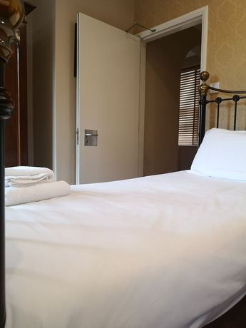 Imagen de la habitación del Hotel Charlotte House. Foto 5