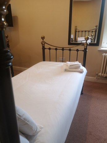 Imagen de la habitación del Hotel Charlotte House. Foto 11