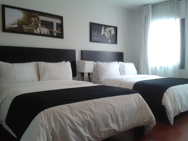 Imagen de la habitación del Hotel Charlotte Suite 26. Foto 13