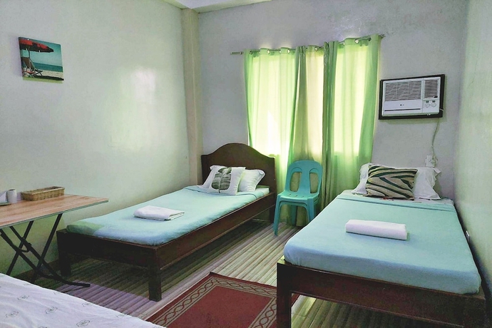 Imagen de la habitación del Hotel Charlz Angel Inn. Foto 3