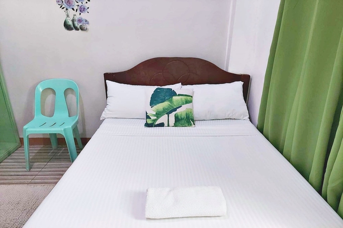 Imagen de la habitación del Hotel Charlz Angel Inn. Foto 4
