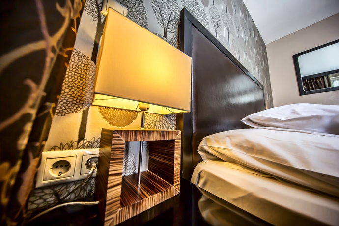 Imagen de la habitación del Hotel Charm Budapest. Foto 8