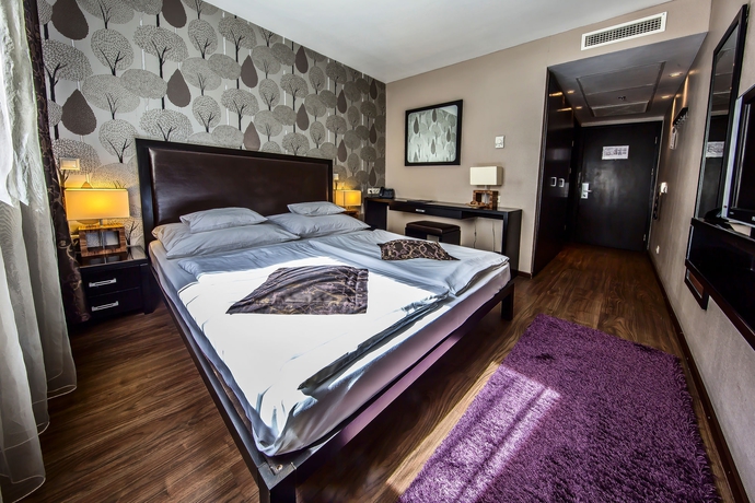 Imagen de la habitación del Hotel Charm Budapest. Foto 9