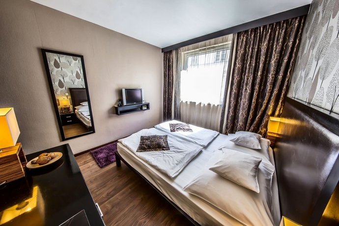 Imagen de la habitación del Hotel Charm Budapest. Foto 10