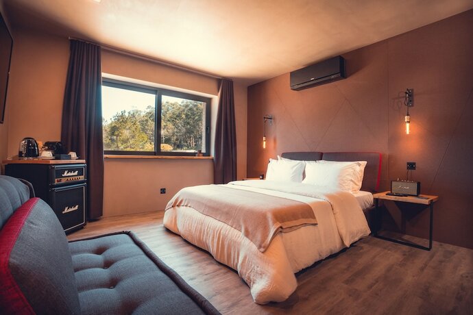 Imagen de la habitación del Hotel Charm Nature. Foto 16