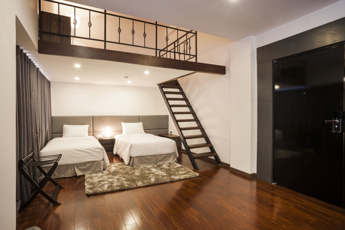 Imagen de la habitación del Hotel Charm Suite Saigon. Foto 3