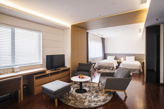 Imagen de la habitación del Hotel Charm Suite Saigon. Foto 9