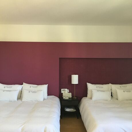 Imagen de la habitación del Hotel Charmant. Foto 17