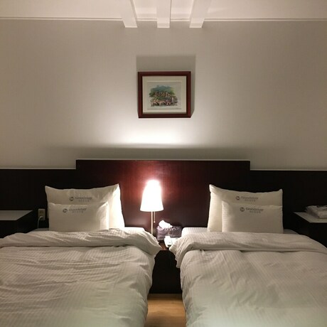 Imagen de la habitación del Hotel Charmant. Foto 19
