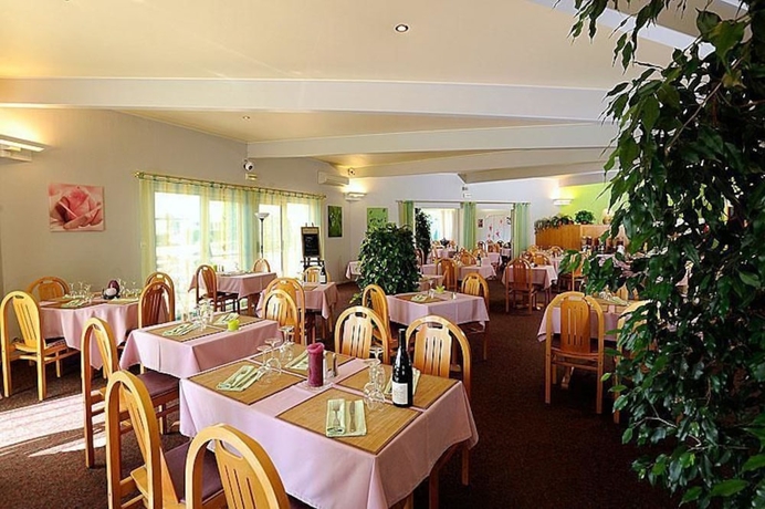 Imagen del bar/restaurante del Hotel Charme En Beaujolais. Foto 5