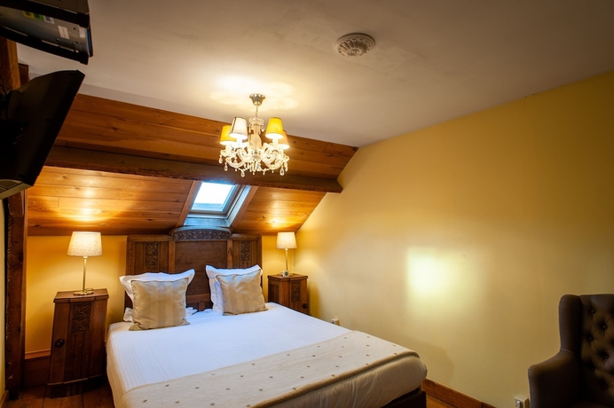 Imagen de la habitación del Hotel Charme Hancelot. Foto 17