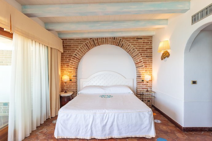 Imagen de la habitación del Hotel Charme La Bitta. Foto 15