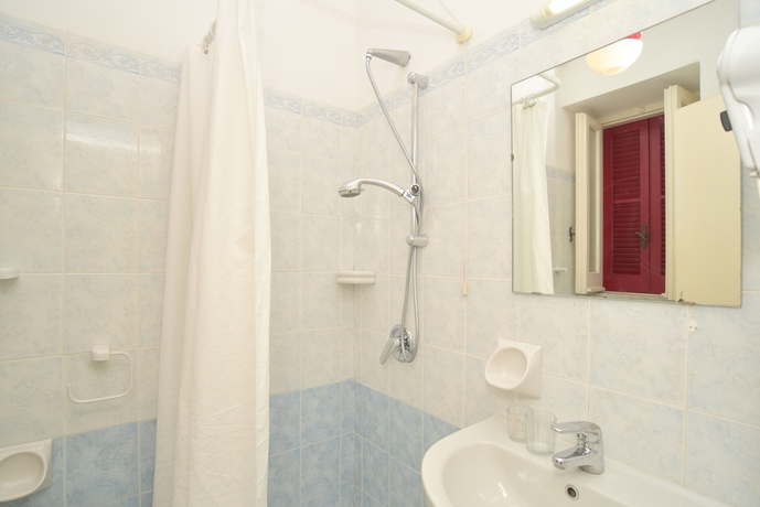 Imagen de la habitación del Hotel Charme La Villa Tina. Foto 5