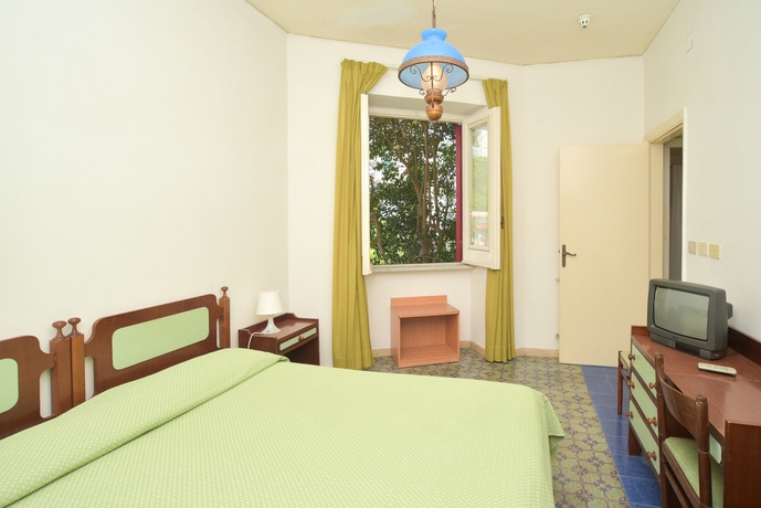 Imagen de la habitación del Hotel Charme La Villa Tina. Foto 7