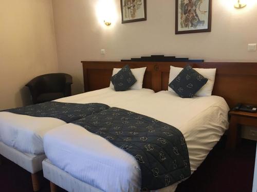 Imagen de la habitación del Hotel Charme Montb&eacute;liard. Foto 7