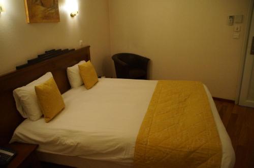 Imagen de la habitación del Hotel Charme Montb&eacute;liard. Foto 8