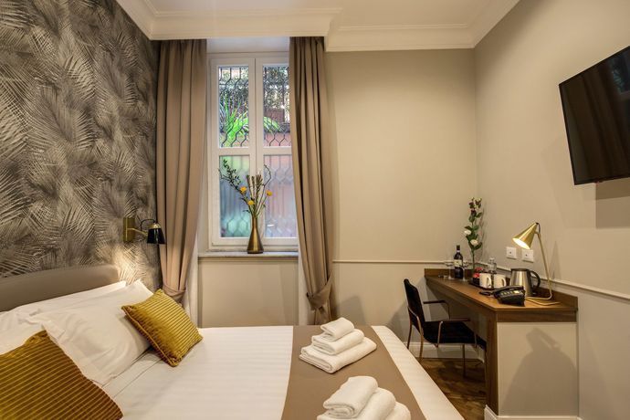 Imagen de la habitación del Hotel Charme Spagna Boutique. Foto 8