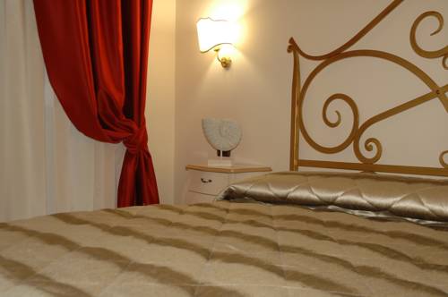 Imagen de la habitación del Hotel Charme Villa Principe Di Fitalia. Foto 7