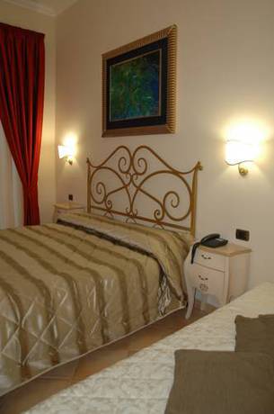 Imagen de la habitación del Hotel Charme Villa Principe Di Fitalia. Foto 11