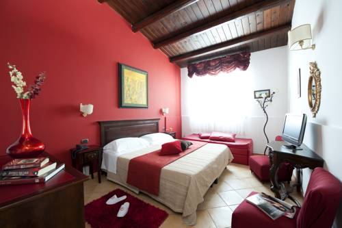 Imagen de la habitación del Hotel Charme Villa Principe Di Fitalia. Foto 12