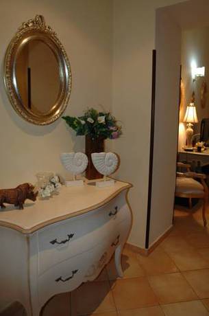 Imagen de la habitación del Hotel Charme Villa Principe Di Fitalia. Foto 13