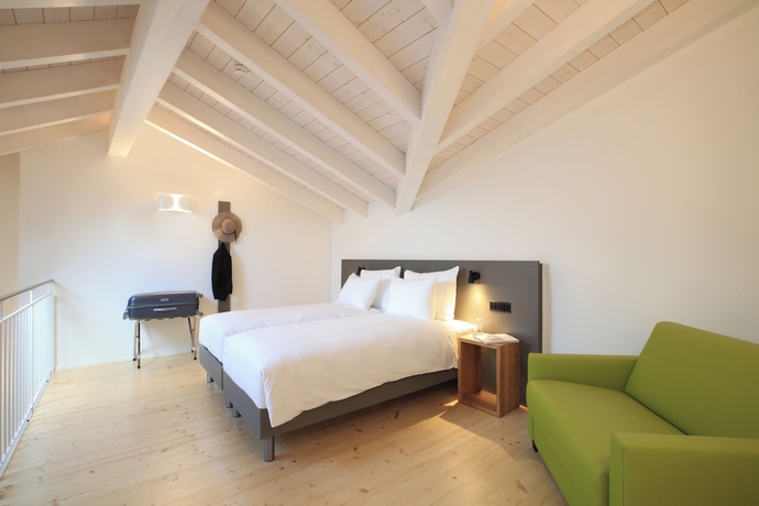 Imagen de la habitación del Hotel Charme al Torchio. Foto 2
