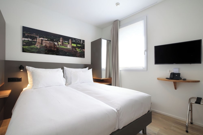 Imagen de la habitación del Hotel Charme al Torchio. Foto 10