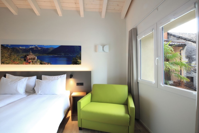 Imagen de la habitación del Hotel Charme al Torchio. Foto 14