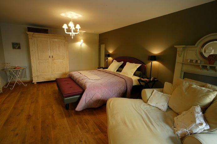 Imagen de la habitación del Hotel Charmehotel Manoir Ogygia. Foto 6