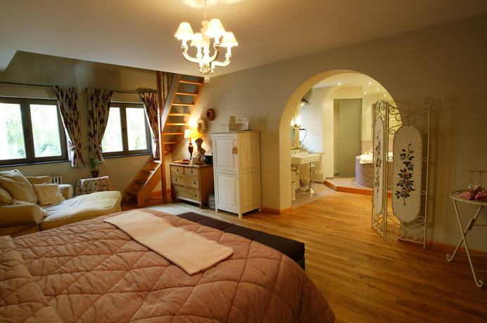 Imagen de la habitación del Hotel Charmehotel Manoir Ogygia. Foto 10