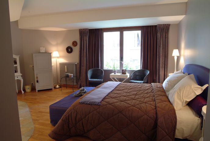 Imagen de la habitación del Hotel Charmehotel Manoir Ogygia. Foto 15